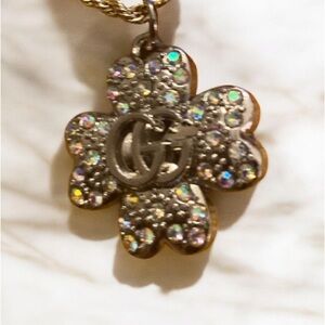 Gucci Elegant Gold Flower Pendant